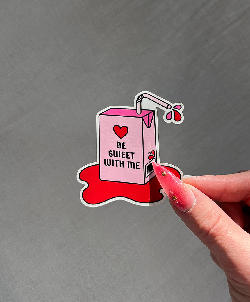 Be Sweet with Me Sticker next to a hand for size comparison