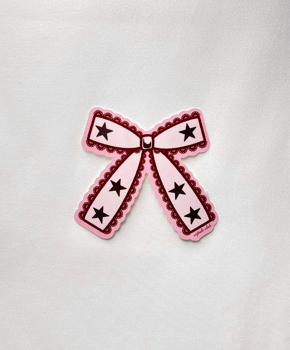 Coquette Lace Bow Vinyl Sticker featuring lace trim and red stars