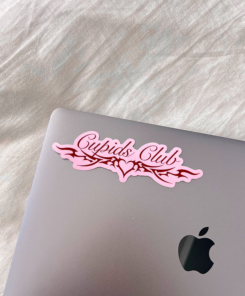 Cupids Club Vinyl Sticker in Pink on laptop computer for size comparison