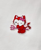 Devil Kitty Sticker featuring a cute white kitty dressed as a red devil, holding a pink pitchfork