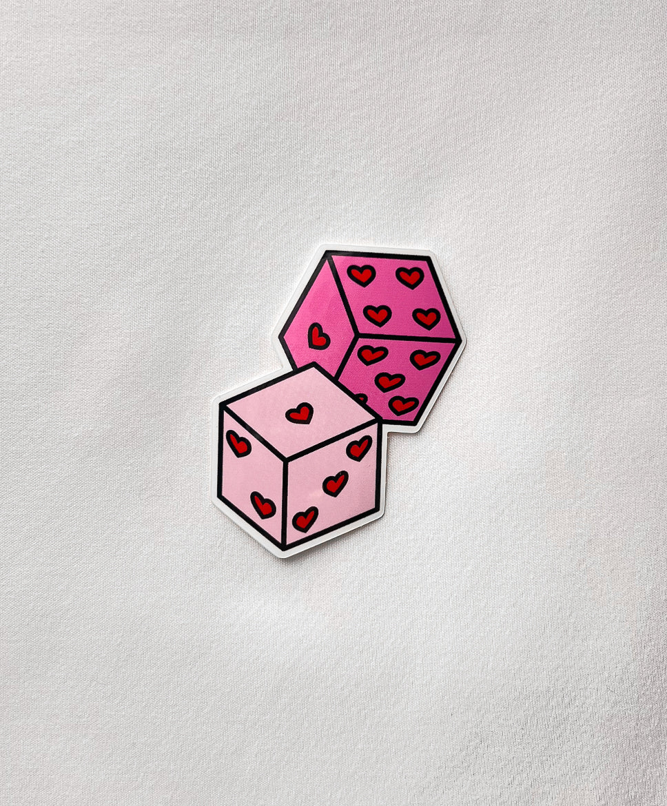 Roll the Dice Sticker featuring pink dice with hearts