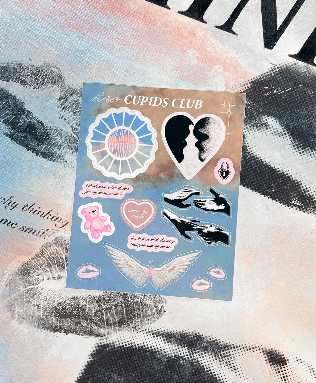 Divine Feminine stickers laying on Divine Feminine print collection.