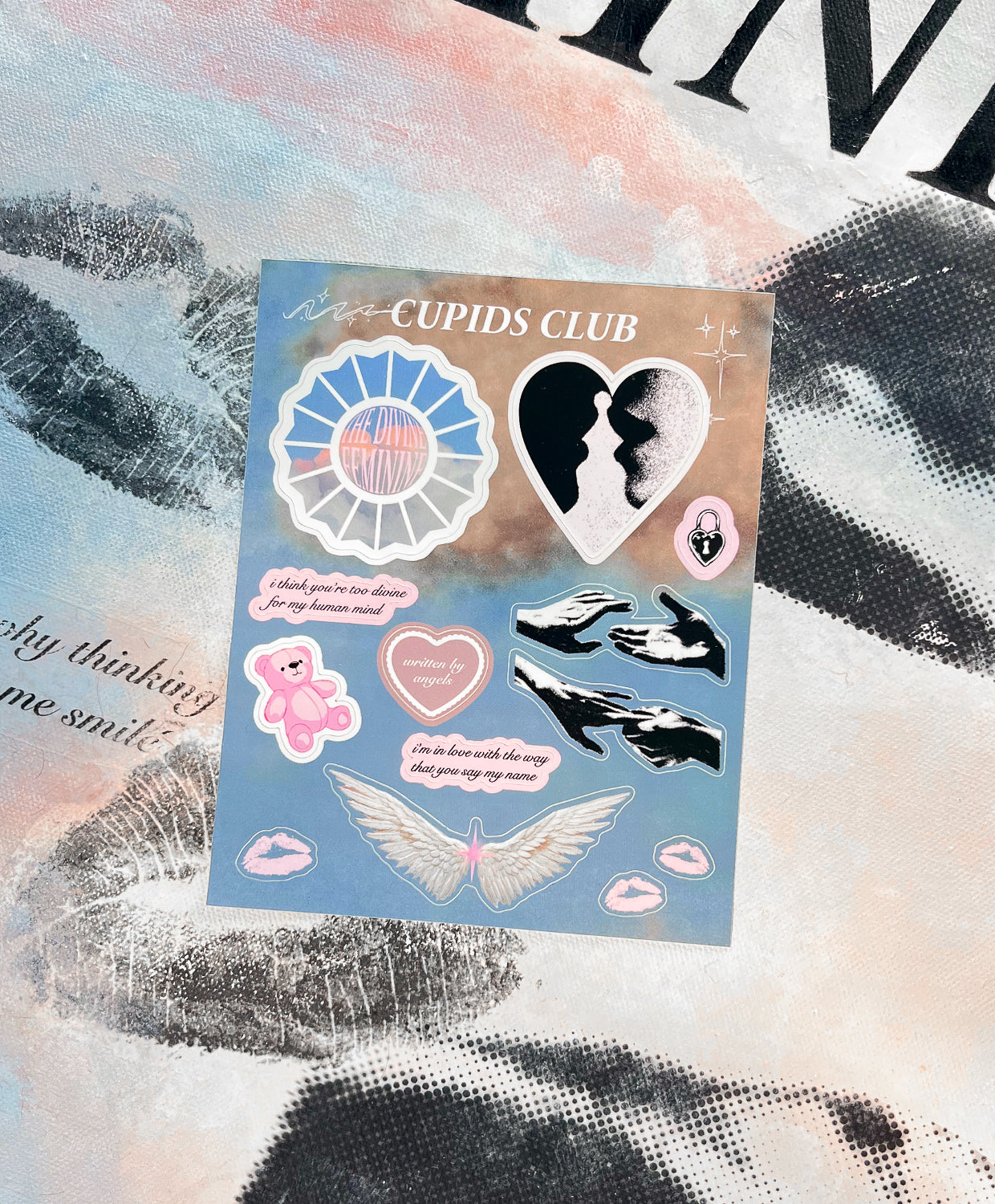 Divine Feminine stickers laying on Divine Feminine print collection.